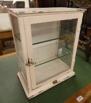 20TH CENTURY PAINTED METAL MEDICINE CABINET WITH SINGLE GLAZED PANEL DOOR OPENING TO GLASS SHELVED