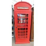 COCKTAIL CABINET MODELLED AFTER A BRITISH TELEPHONE BOX WITH SINGLE GLAZED PANEL DOOR OPENING TO