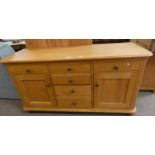 OAK SIDEBOARD WITH 3 FRIEZE DRAWERS OVER 2 PANEL DOORS WITH 3 CENTRALLY SET DRAWERS,
