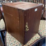 MAHOGANY TABLE TOP CABINET WITH SINGLE PANEL DOOR WITH DECORATIVE BRASS HANDLE OPENING TO SHELVED
