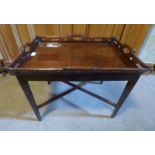 19TH CENTURY MAHOGANY TRAY TOP TABLE WITH CARVED DECORATION ON SQUARE SUPPORTS WITH LATER
