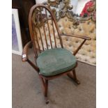 ERCOL ROCKING CHAIR Condition Report: The lot has age related marks,