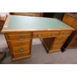 LATE 19TH CENTURY OAK TWIN PEDESTAL DESK WITH LEATHER INSET TOP & 3 FRIEZE DRAWERS OVER 2 STACKS OF