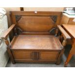 20TH CENTURY OAK MONKS BENCH WITH LIFT-UP SEAT,