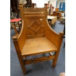 20TH CENTURY CARVED OAK ALTAR CHAIR ON SQUARE SUPPORTS LABELLED M.R.L.S.