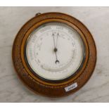 LATE 19TH CENTURY ANEROID BAROMETER IN DECORATIVE FRAME,