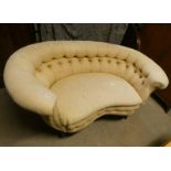 19TH CENTURY OVERSTUFFED BUTTON BACK 2 SEATER SETTEE WITH SHAPED SEAT ON TURNED SUPPORTS