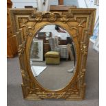 GILT FRAMED MIRROR WITH OVAL BEVELLED EDGE GLASS,