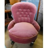 19TH CENTURY BUTTON BACK CHAIR ON EBONISED TURNED SUPPORTS