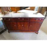 STAG MAHOGANY SIDEBOARD WITH 3 DRAWERS OVER 3 PANEL DOORS.