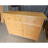 OAK CABINET WITH 3 DRAWERS OVER 2 PANEL DOORS 94 CM TALL X 118.