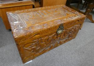 EASTERN HARDWOOD KIST WITH DECORATIVE ORIENTAL CARVING LABELLED 'DONGYANG CARVED WOODEN' TO