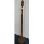 EASTERN HARDWOOD STANDARD LAMP WITH CARVED ORIENTAL DECORATION ON CIRCULAR BASE