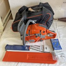 HUSQVARNA AUTOTUNE 560 XP X-TORQ PETROL CHAINSAW WITH 18 INCH BAR IN UNUSED UNASSEMBLED CONDITION