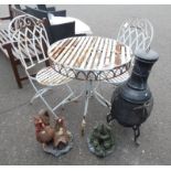 WROUGHT IRON CIRCULAR TABLE & 2 CHAIRS, ORNAMENT OF HENS,