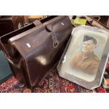 COW HIDE LEATHER DOCTORS BAG ALONG WITH A FRAMED PICTURE OF A SOLDIER