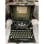 IMPERIAL PORTABLE (AU943) TYPE WRITER IN CASE WITH INTERIOR LABEL DATED 1937