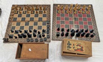TWO CARVED WOODEN CHESS SETS WITH TWO CHESS BOARDS -4- Condition Report: Boards are