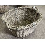 LARGE WICKER BASKET WITH 2 HANDLES, METAL REINFORCEMENT & WOOD SLIDERS TO BASE,