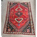 RED MIDDLE EASTERN RUG.