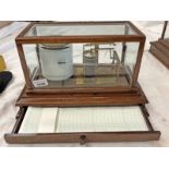 BAROGRAPH WITH BRASS FRAME & EIGHT VACUUM SECTIONS IN A GLAZED MAHOGANY CASE