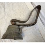 COW BELL WITH LEATHER STRAP METAL BELL BODY MARKED PARTIALLY "CHIANTEL....