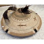 CLOTH AND FIBRE BOUND HAT WITH STITCHED AND FEATHER DECORATION