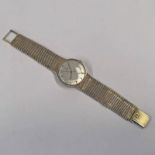 OMEGA AUTOMATIC 9CT GOLD GENTS WRISTWATCH ON A 9CT GOLD MESH LINK BRACELET - 55.