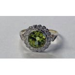 18CT GOLD PERIDOT & DIAMOND CLUSTER RING,