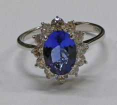 18 CT GOLD TANZANITE & DIAMOND CLUSTER RING,