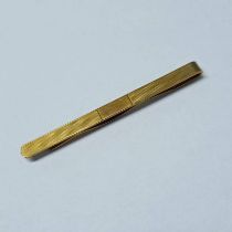 9CT GOLD TIE BAR - 8.