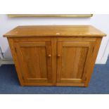 ERCOL BLONDE BEECH WOOD SIDEBOARD WITH 2 PANEL DOORS OPENING TO FITTED INTERIOR WITH SINGLE DRAWER.