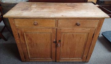 19TH CENTURY PINE DRESSER WITH 2 DRAWERS OVER 2 PANEL DOORS OPENING TO SHELVED INTERIOR 94 CM TALL