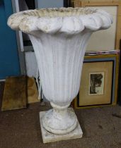 RECONSTITUTED STONE TULIP GARDEN URN ON PLINTH BASE.