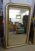 19TH CENTURY GILT FRAMED OVER MANTLE MIRROR WITH SILVERED DECORATION.