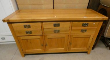 21ST CENTURY OAK SIDEBOARD WITH 6 DRAWERS OVER 3 PANEL DOORS ON SQUARE SUPPORTS,