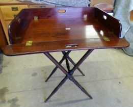 19TH CENTURY MAHOGANY TRAY TABLE WITH BRASS HINGES & FOLDING BASE ON TURNED SUPPORTS