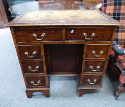 19TH CENTURY MAHOGANY KNEEHOLE DESK WITH LEATHER INSET TOP & CENTRALLY SET PANEL DOOR FLANKED