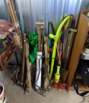 GOOD SELECTION OF GARDEN TOOLS TO INCLUDE ELECTRIC STRIMMER, SHOVELS,