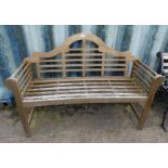 WOODEN GARDEN BENCH WITH SHAPED BACK Condition Report: The lot is a hardwood of