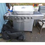 OUTBACK METEOR GAS BBQ WITH COVER Condition Report: The lot is in used condition.