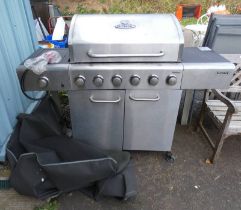 OUTBACK METEOR GAS BBQ WITH COVER Condition Report: The lot is in used condition.
