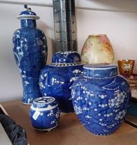 4 LIDDED CHINESE BLUE AND WHITE VASES ON 1/2 SHELF Condition Report: Larger lidded