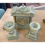 19TH CENTURY GREEN HARD STONE CLOCK WITH GILT METAL FACE AND CORINTHIAN COLUMNS WITH A PAIR OF SIDE