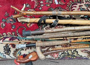 SELECTION OF FISHING RODS, WADING STICK, THUMB STICK ETC.