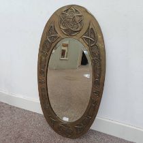 ARTS & CRAFTS STYLE BRASS FRAMED MIRROR WITH CELTIC KNOT DECORATION,