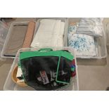 4 PLASTIC BOXES CONTAINING BED LINEN, RUGS, CUSHIONS,