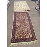 TWO MIDDLE EASTERN RUGS 180 CM X 90 CM AND 150 CM X 104 CM