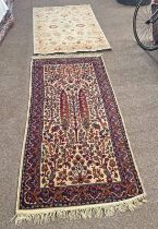 TWO MIDDLE EASTERN RUGS 180 CM X 90 CM AND 150 CM X 104 CM