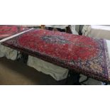 RICH RED GROUND PERSIAN KASHAN CARPET WITH FLORAL MEDALLION DESIGN,